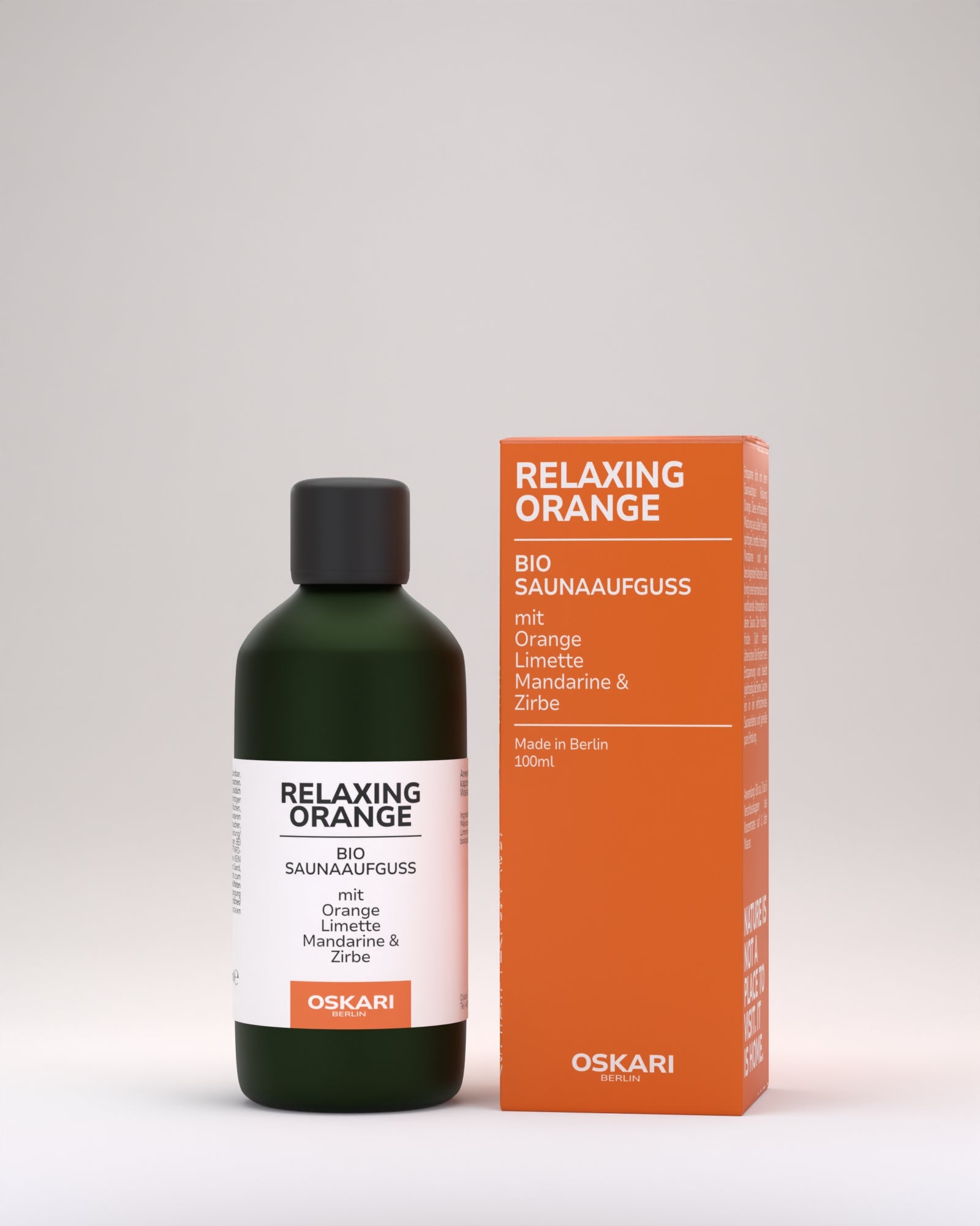 Natürlicher Bio Saunaaufguss Relaxing Orange mit Bio Saunaöl von Oskari mit grüner Flasche und orangefarbener Schachtel