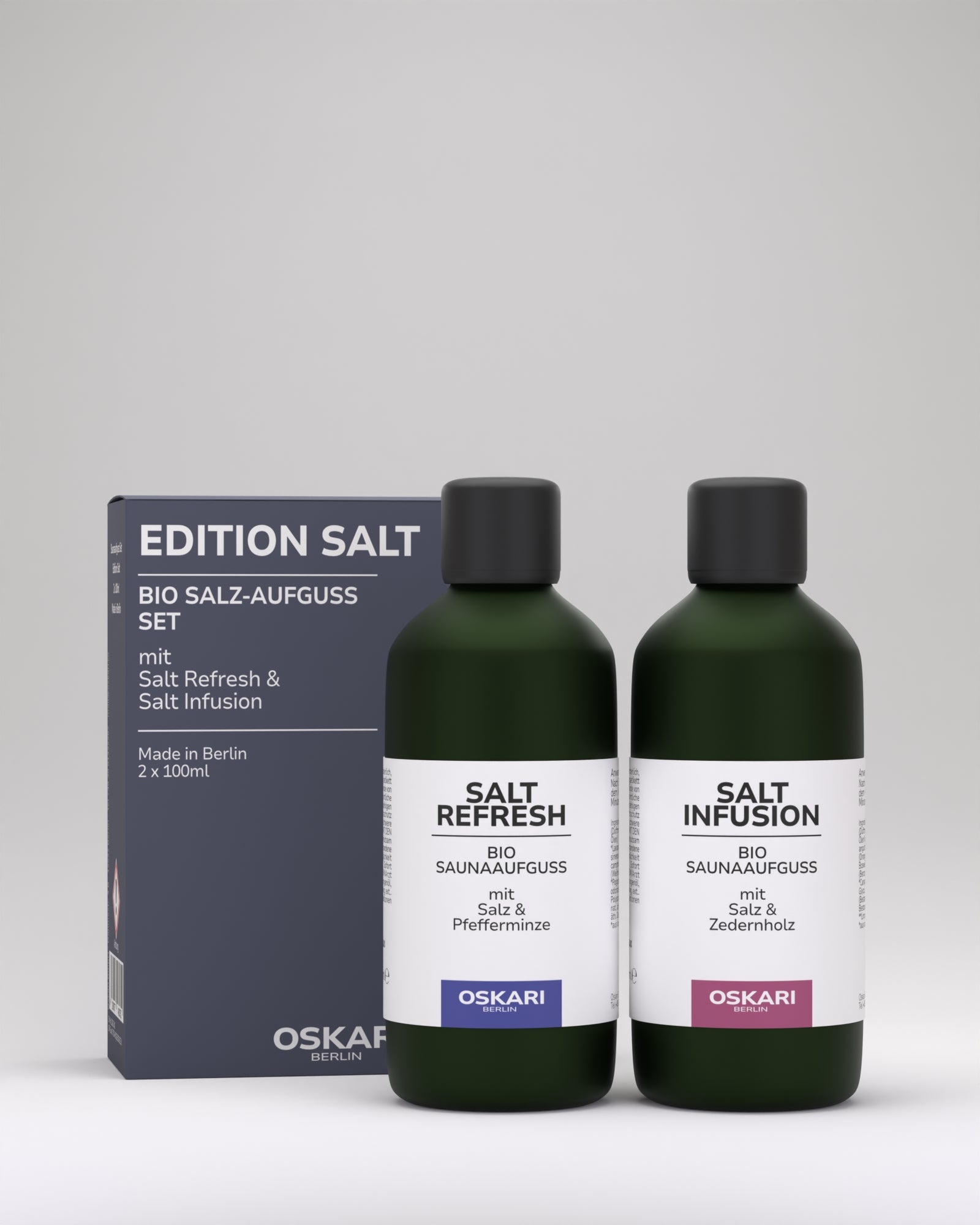 Oskari Bio Sauna Aufguss Set Edition Salt mit den beiden Saunaaufgüssen in einer grünen Flasche