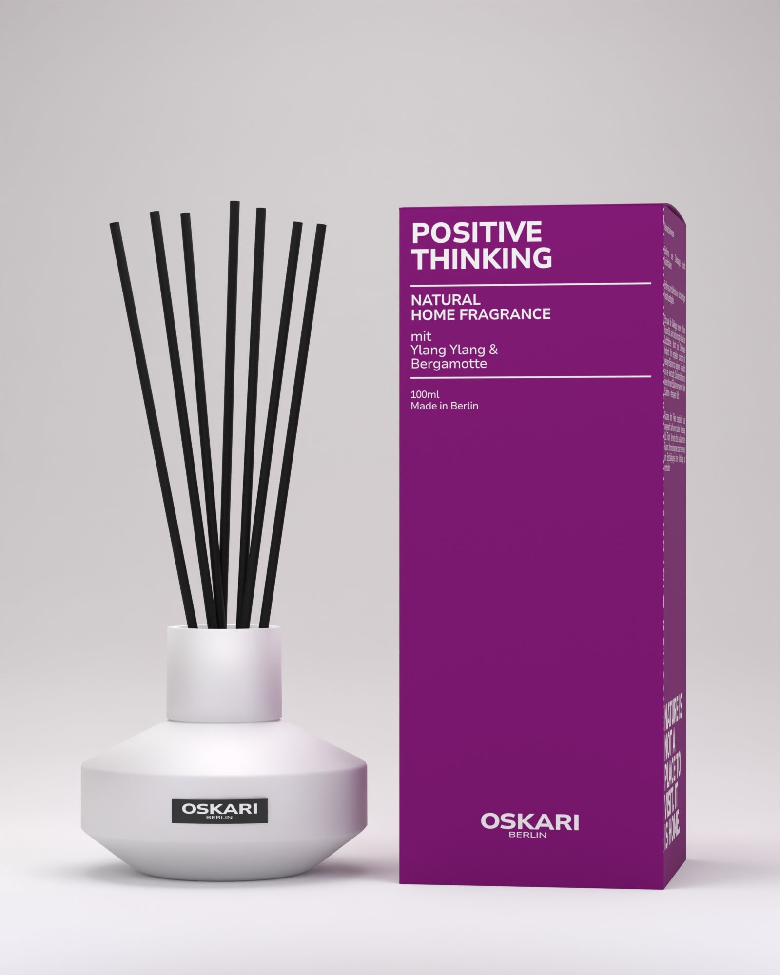 Oskari Raumduft mit Stäbchen Positive Thinking im Glasflakon und neben Schachtel stehend