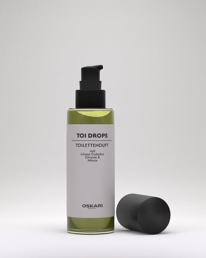 Pre-Poo WC-Duft Toi Drops Flasche mit abgenommen Deckel vor hellem Hintergrund