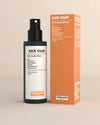 Bio Raumspray Kick Start mit Sprühkopf neben leuchtend orangefarbener Schachtel